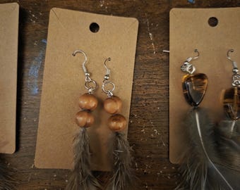 Pendientes de plumas de origen ético