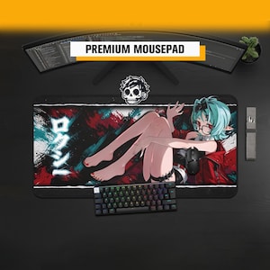 May include: A rectangular desk mat featuring an anime-style character with teal hair and glasses, wearing a red jacket. The design includes abstract red and teal brushstrokes, Japanese text, and a skull icon. A black computer mouse sits on the mat.