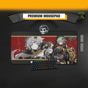 Peut inclure: Un tapis de souris rectangulaire présentant une illustration de style anime de deux personnages aux cheveux gris et verts sur un fond rouge avec des motifs de barbelés. Le design inclut le texte PREMIUM MOUSEPAD et une icône de crâne au-dessus.