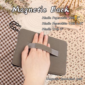 May include: A gray Kindle case with a hand strap, featuring the text "Magnetic Back" and "Magnetic front-back hold." Compatible with Kindle Paperwhite 12th 7", Kindle Paperwhite 11th 6.8", and Kindle 11th 6".