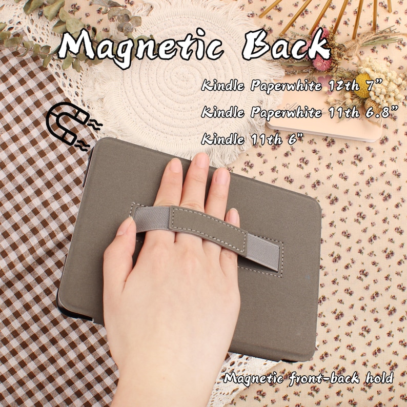 May include: A gray Kindle case with a hand strap, featuring the text "Magnetic Back" and "Magnetic front-back hold." Compatible with Kindle Paperwhite 12th 7", Kindle Paperwhite 11th 6.8", and Kindle 11th 6".