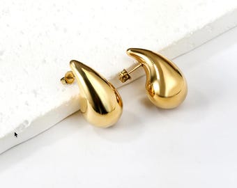 Pendientes ovalados colgantes