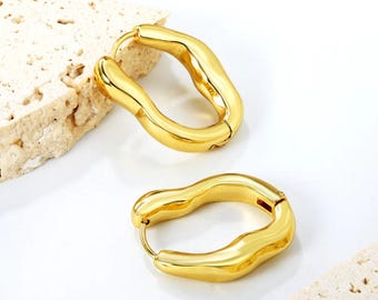 Pendientes irregulares de forma sólida en 0, color dorado
