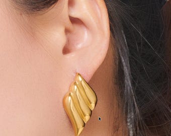 Pendientes de botón de triple ala