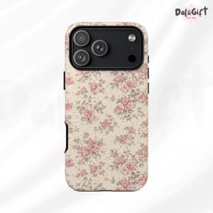 May include: A phone case with a floral pattern of pink roses and green leaves on a cream background. The case has a camera cutout and a black border. The Dal&Gift logo is visible in the upper right corner.