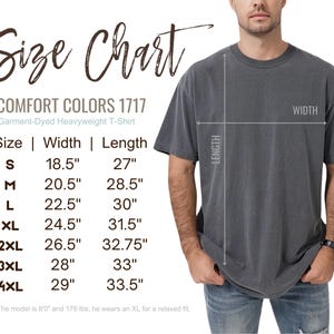 May include: A size chart for a Comfort Colors 1717 garment-dyed heavyweight t-shirt. The chart lists sizes S to 4XL with width and length measurements in inches. A person models the shirt, demonstrating the fit. The model is 6'0" and 176 lbs, wearing an XL.