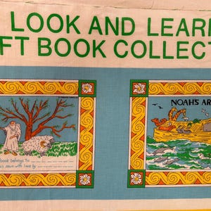 May include: A fabric panel from a "Look and Learn Soft Book Collection" featuring illustrations. One panel shows Noah's Ark, the other a shepherd with a sheep. The text "NOAH'S ARK" is visible.