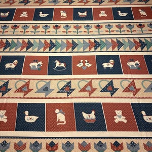 May include: A fabric with a repeating pattern of squares and stripes. The squares feature images of animals like ducks, cats, and teddy bears. The color scheme includes red, blue, and beige, with floral and geometric designs.