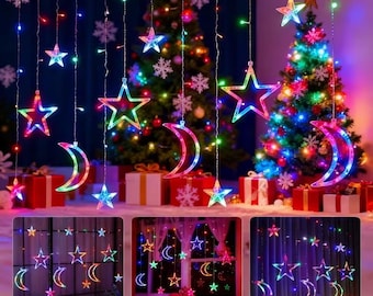 May include: A Christmas display with multi-coloured star and crescent moon fairy lights. The lights are suspended in front of decorated Christmas trees and wrapped presents. Additional images show the lights in different settings.