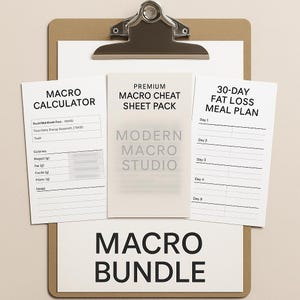 May include: A clipboard holds several white sheets with text. The sheets include a macro calculator, a macro cheat sheet pack, and a 30-day fat loss meal plan. The words "Macro Bundle" are at the bottom.