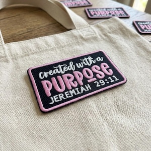 May include: A set of three ceramic mugs with a speckled, matte finish. The mugs are in shades of cream, light gray, and dark gray. Each mug has a simple, minimalist design and a rounded handle.