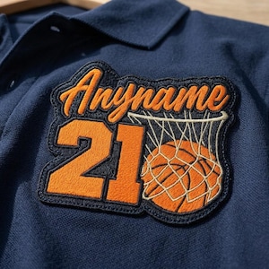 May include: A white ceramic mug with a black handle and the text "But First, Coffee" in a black, bold font. The mug is sitting on a wooden surface. The mug is approximately 4 inches tall.