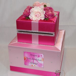 Roze en fuchsia/felroze kartonnen doos - zijden bloemen - strass-accenten