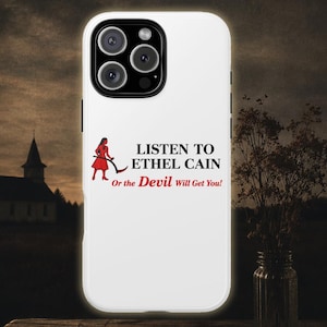 May include: A white smartphone case featuring a graphic of a person in a red dress holding a scythe. The text reads: LISTEN TO ETHEL CAIN Or the Devil Will Get You! The case has a black camera cutout area with three circular lenses and a flash.