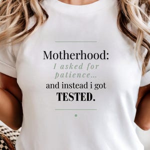 Sarcastic Mom Shirt, Funny Motherhood Quote Tee, Mother’s Day Gift for Mom, Tired Mom Life Shirt, “I Asked for Patience and Got Tested Inste