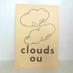 May include: A vintage educational card with a beige background features two cartoon clouds outlined in black. The word "clouds" is printed in black, with the letters "ou" below. The card has a number "62" in the bottom left corner.