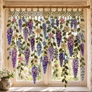 May include: A crochet window valance featuring hanging wisteria-like floral strands in shades of purple, lavender, and blue, interspersed with small cream-colored roses and green leaves, suspended from a wooden rod across a window frame.