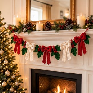 May include: A festive garland featuring alternating red and cream-colored crocheted bows, interspersed with green crocheted holly leaves and clusters of small red berries, draped across a white fireplace mantel with lit candles.