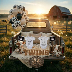 May include: A vintage pickup truck bed is decorated with baby items for a pregnancy announcement. The bed contains baby clothes, stuffed cows, sonogram photos, and balloons. A wooden sign says "Twins" and "Twin Dairy Farm".
