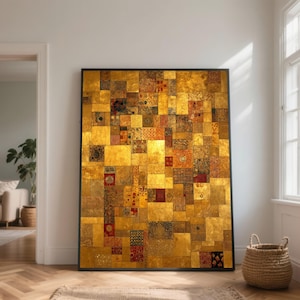 Può includere: Grande opera d'arte incorniciata con un mosaico di quadrati dorati, rossi e marroni. L'opera ha una cornice nera ed è appoggiata a una parete bianca. Il design del mosaico presenta motivi e trame intricati.