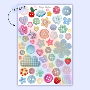 Op de afbeelding: Een vel met kleurrijke, decoratieve knopen in verschillende vormen, waaronder harten, sterren, bloemen en wolken. De knopen zijn in pastelkleuren en hebben ruitjes-, stippen- en effen ontwerpen. De tekst "HOLO!" is zichtbaar, samen met de tekst "Cutesy Buttons".