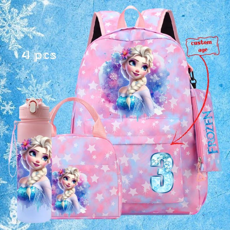 May include: A pink Frozen-themed backpack set featuring Elsa. The set includes a backpack, lunch bag, water bottle, and pencil case. The backpack has a large image of Elsa and the number 3. The set is decorated with stars and snowflakes.