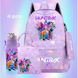 May include: A four-piece purple school set featuring a backpack, lunch bag, pencil case, and water bottle. Each item is decorated with a star graphic and the text "HUNTRX" and "4 pcs". The set has a cartoon illustration of several women.