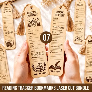May include: A set of light-colored wooden bookmarks featuring laser-engraved text and illustrations. Each bookmark includes sections for book titles, authors, genres, and reading progress, topped with a beige tassel. Designs include mountains, books, and stars.