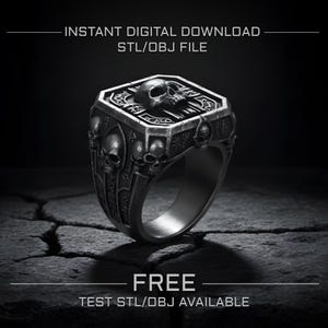 May include: A dark, metallic ring with a skull design. The ring features a hexagonal top with a skull and crossbones, surrounded by smaller skulls and gothic detailing. The text "INSTANT DIGITAL DOWNLOAD STL/OBJ FILE" and "FREE TEST STL/OBJ AVAILABLE" are visible.