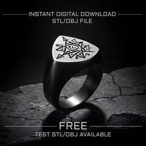May include: A black ring with a silver, triangular face featuring an eye and geometric design. The ring is set against a dark background with the text "INSTANT DIGITAL DOWNLOAD STL/OBJ FILE" and "FREE TEST STL/OBJ AVAILABLE".