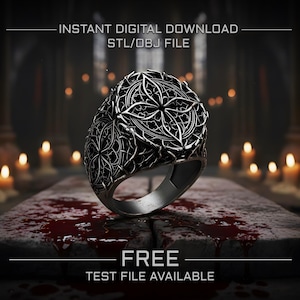 May include: A detailed, dark metal ring with an ornate floral design. The ring is set against a blurred background with the text "INSTANT DIGITAL DOWNLOAD STL/OBJ FILE" and "FREE TEST FILE AVAILABLE".