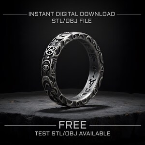 May include: A silver ring with intricate occult symbols, including moons, stars, and an eye, is displayed against a dark background. The ring's design is detailed, with etched patterns. Text at the top reads "INSTANT DIGITAL DOWNLOAD STL/OBJ FILE" and at the bottom "FREE TEST STL/OBJ AVAILABLE."
