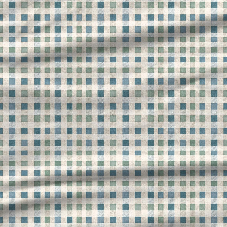 Blue green winter patchwork digital paper with woven fabric textures, diagonal brush marks, cream accents, and small quilt-like blocks arranged in a seamless repeating pattern for cottagecore crafts and textile design.
