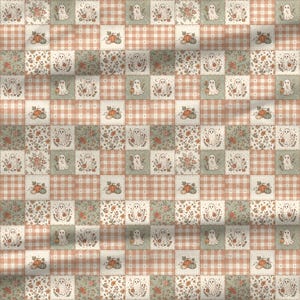 Pastel Halloween fabric featuring adorable ghosts floral quilt blocks and pink plaid