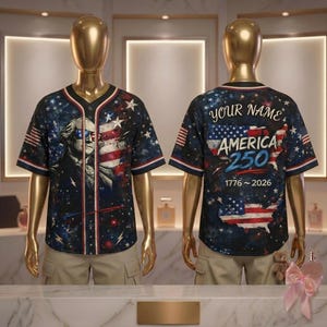 May include: A baseball jersey with a patriotic design featuring George Washington wearing sunglasses, the American flag, and stars. The back of the jersey says "YOUR NAME" and "AMERICA 250" with the years 1776-2026.