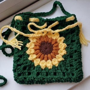 May include: A rustic wooden sign with the text "Welcome to our home" in white lettering. The sign features a distressed finish and a simple, inviting design, perfect for entryway decor.