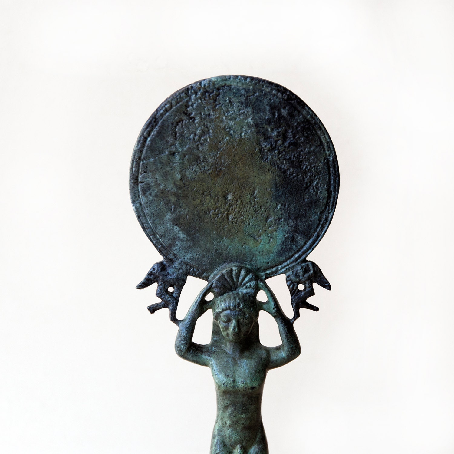 Ancient Greek Mirror with a Support of a Young Boy and Two Eros (Cupid)