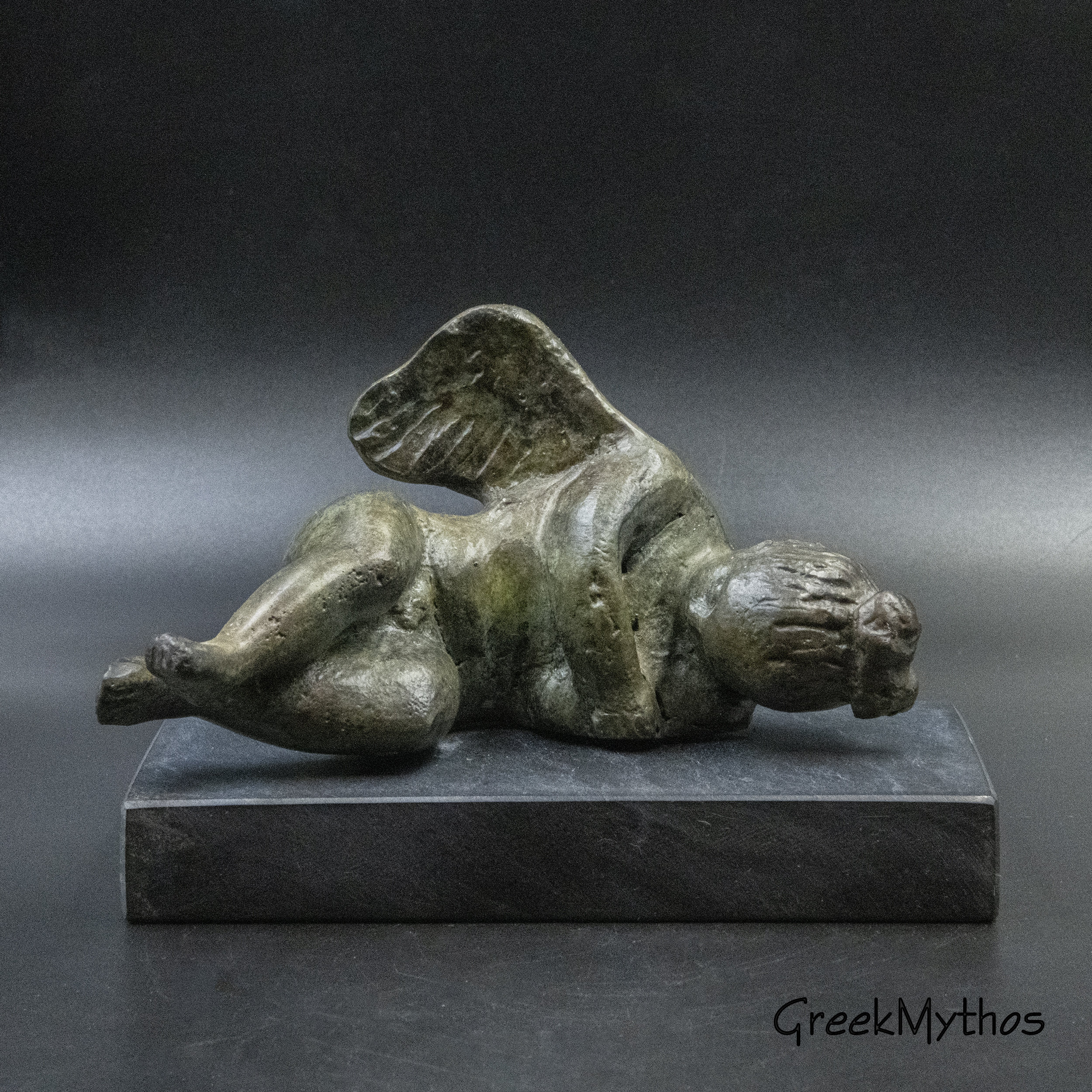 bronze statue of eros sleeping