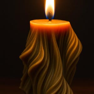 May include: A burning candle with a distinctive, textured design. The candle's body has a wavy, draped appearance in shades of brown and orange. The flame is bright yellow and orange against a dark backdrop, creating a warm atmosphere.