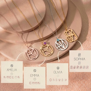 May include: A selection of personalised necklaces with geometric pendant designs. The necklaces are in gold, silver, and rose gold tones, some with gemstones. Each necklace has a name associated with it, such as Amelia, Emma, Olivia, and Sophia.