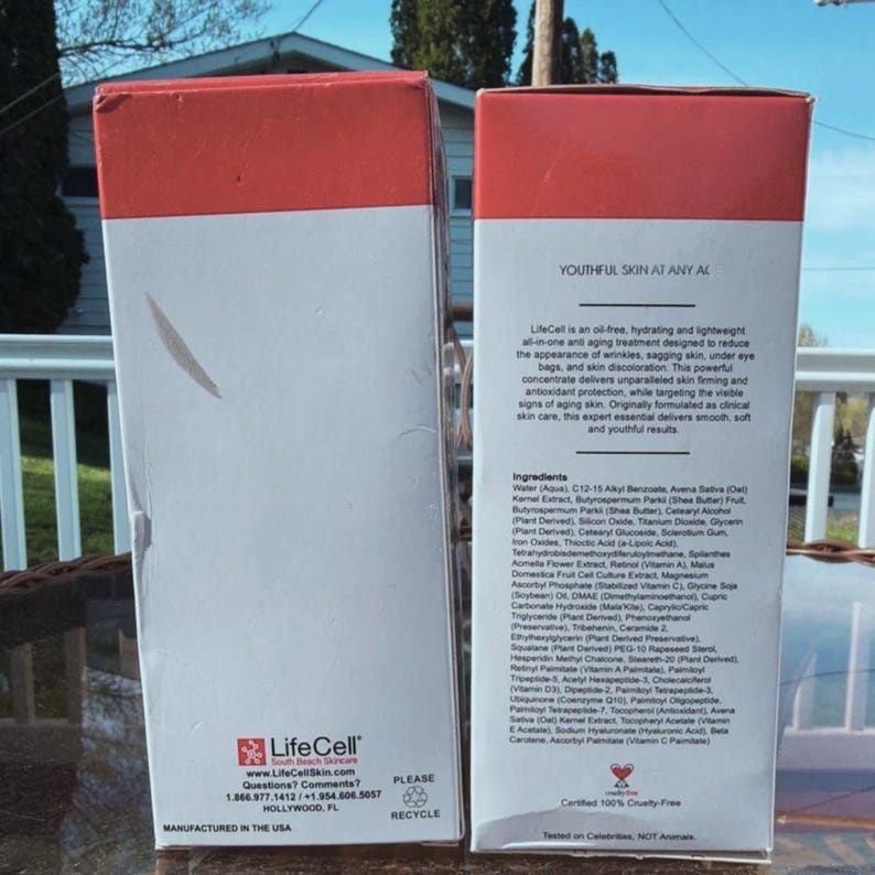 May include: Two white and red LifeCell skincare product boxes. The boxes have text that describes the product as an oil-free, hydrating, and lightweight anti-aging treatment. The boxes also list the ingredients and company information.