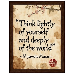 May include: A framed print with a dark brown wooden frame. The print has a vintage paper background with brown stains and a floral branch at the top. The text reads "Think lightly of yourself and deeply of the world" by Miyamoto Musashi.