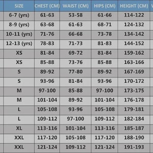 May include: A detailed size chart with measurements in centimeters for chest, waist, hips, height, and weight. Sizes range from XS to XXL, with corresponding age ranges for children's sizes. The chart is on a light blue background.