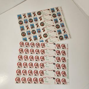 2 full sheets Christmas seals and tags 1980s Santa Claus face and Christmas Mouse Vintage paper art supplies ephemera lot collage journal