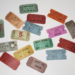 May include: A collection of vintage movie and theater tickets in various colors, including red, orange, green, and blue. The tickets feature text such as "ADMIT ONE" and theater names. Some tickets are marked with prices.