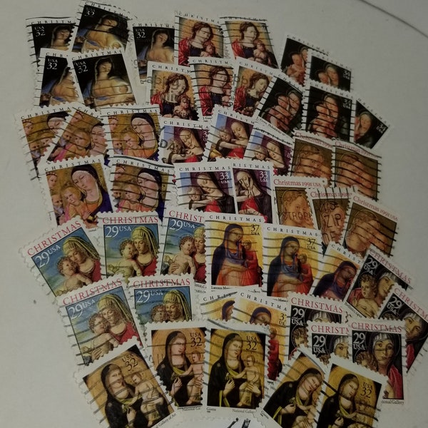 50 Christmas stamps Mother & child Madonna 5 each 10 different designs used cancelled US postage vintage paper art supplies ephemera lot A
