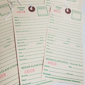 May include: Three vintage repair tags with green and white lines and a red and white "Repair Tag" header. The tags are numbered 44509, 44510, and 44510. The bottom tag is a "Repair Claim Check - Customer Stub".