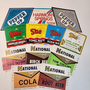 12 different soft drink labels vintage bottle labels NOS sample pack bright bold colors Vintage paper art supplies ephemera lot Y