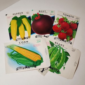 May include: Vintage seed packets for pepper, beet, tomato, corn, and beans. The packets feature colorful illustrations of the vegetables and include the Lone Star Seed Co. logo and price information.