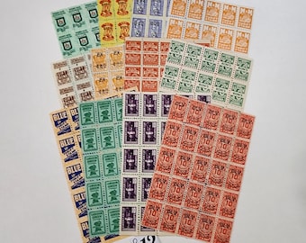 300 saving stamps 12 different sheets of 25 trading stamps sample pack red blue green yellow vintage paper art supplies ephemera lot O12